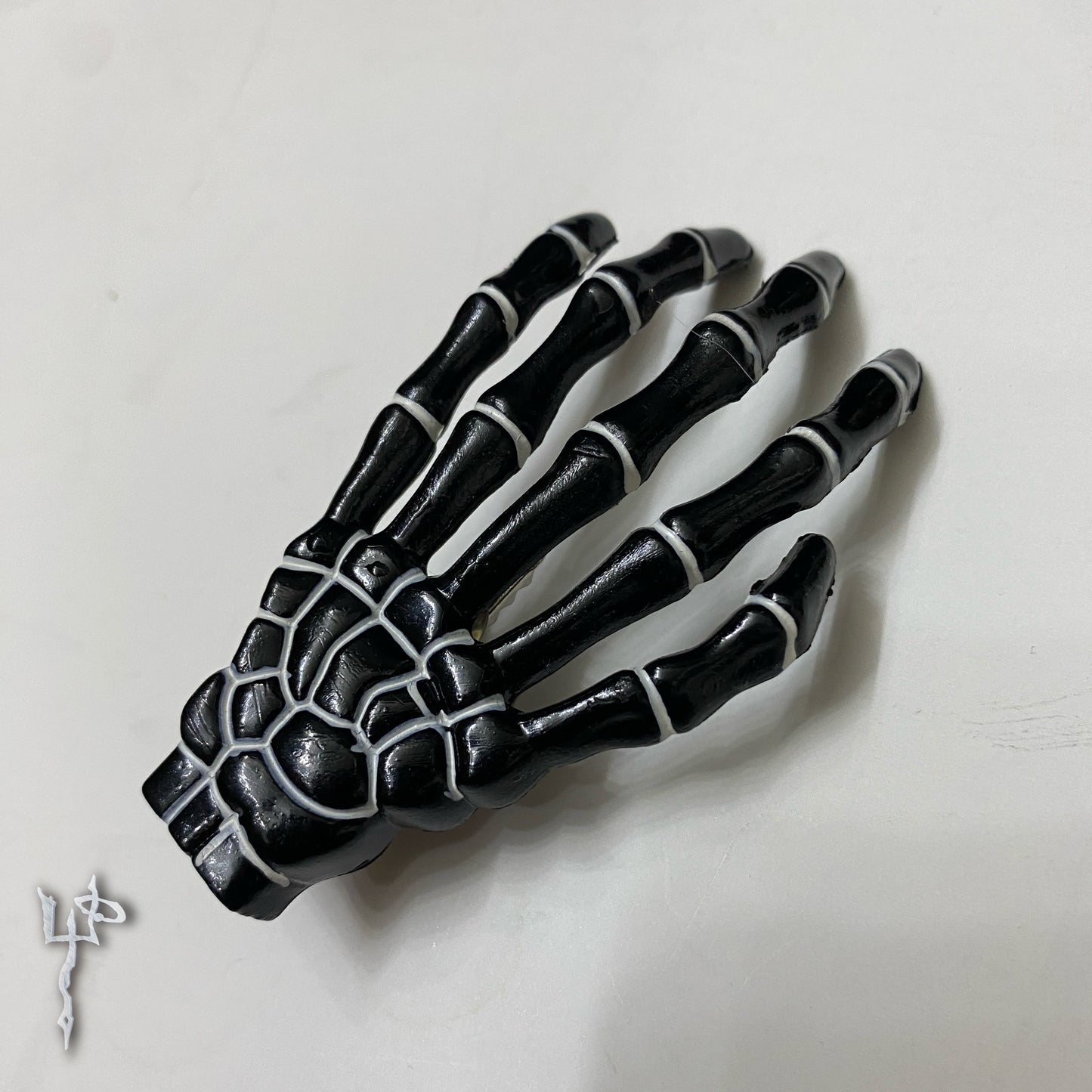 Black + white Skeleton Hand Hair Clip